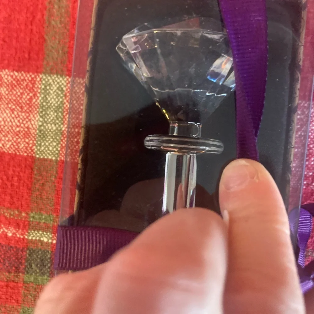 Faux diamond bottle opener. New in box. Super cute & Would make a great gift